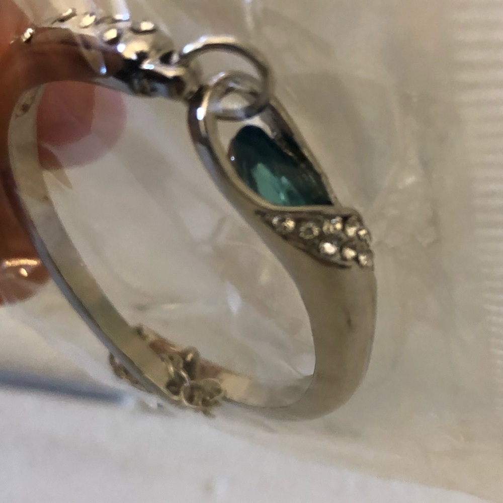 Blue gem in silver bracelet